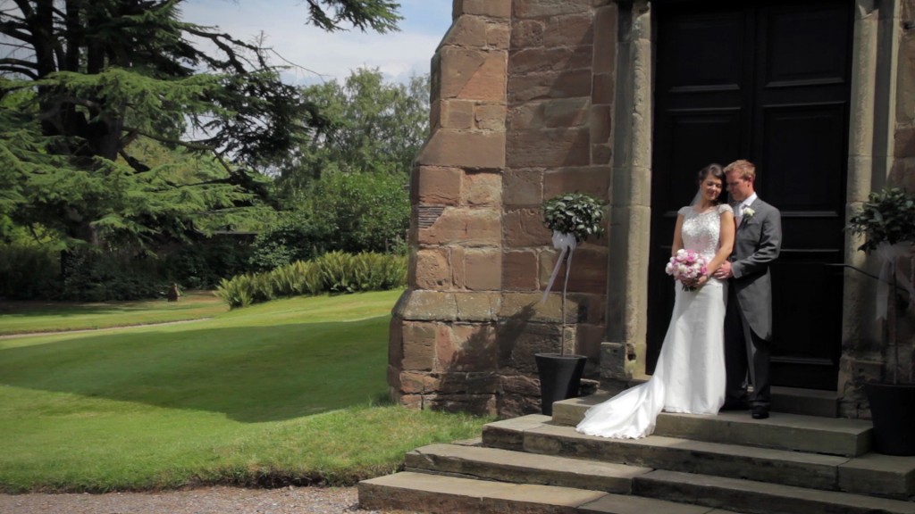 Bride and Groom in embrace outside the church just after getting married.
